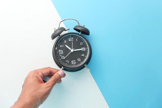 old alarm clock on wooden background