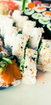 Food, travel and healthy eating concept - Japanese sushi in a restaurant at lunch time, asian cuisine