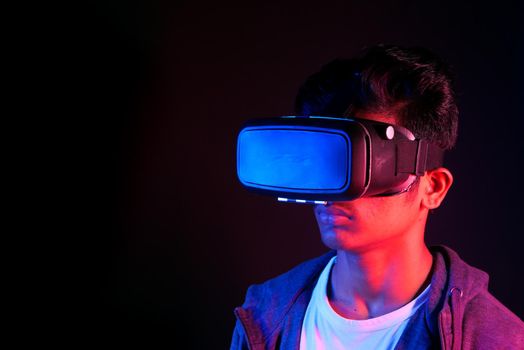 young man wearing virtual reality headset, vr box ,