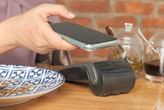 Payment terminal charging from a smart phone, contactless payment