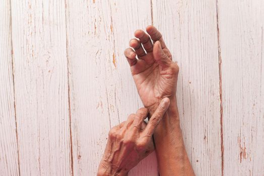 Elderly woman suffering from pain