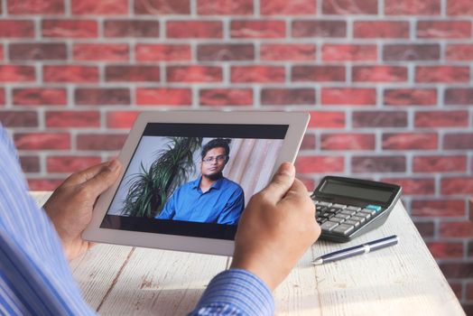 businessman working in video conference, close up