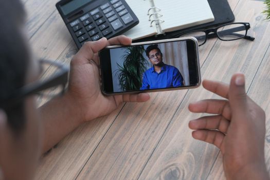 businessman working in video conference, close up