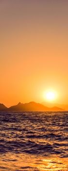 Nature, twilight and vintage beach holiday concept - Summer sunset at the Mediterranean sea coast, seascape and mountain view