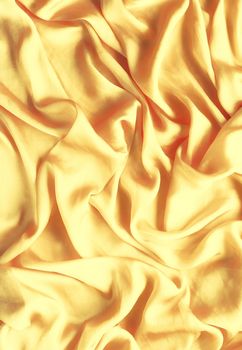 Luxury golden silk background texture - elegant fabric textures, abstract backgrounds and modern pastel colours concept