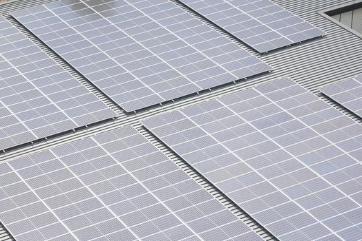Solar pannels on a roof top .