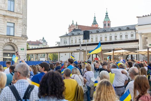 LJUBLJANA, SLOVENIA - August 24, 2022: Ukraine independence day meeting. People with flags and national symbols. High quality photo