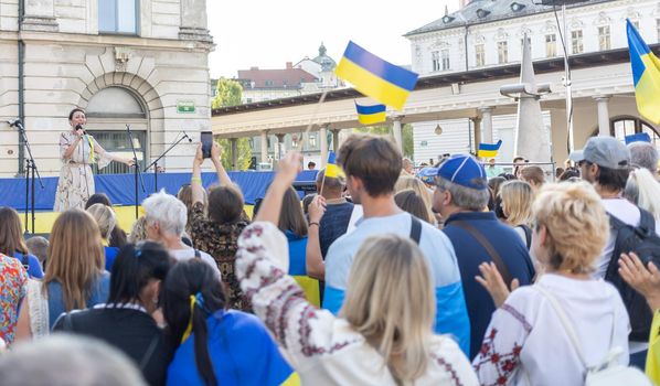 LJUBLJANA, SLOVENIA - August 24, 2022: Ukraine independence day meeting. People with flags and national symbols. High quality photo