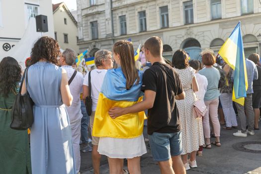 LJUBLJANA, SLOVENIA - August 24, 2022: Ukraine independence day meeting. People with flags and national symbols. High quality photo