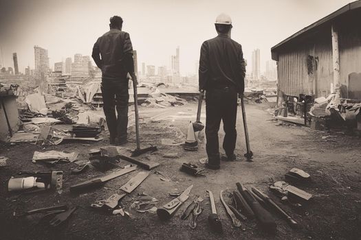 3d render attractive man in work clothes, holding tools in his hands. View from the back of the concept of Labor Day.