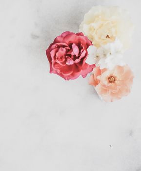 Wedding decor, floral background and beautiful home garden concept - Vintage roses on marble