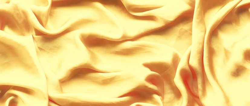 Luxury golden silk background texture - elegant fabric textures, abstract backgrounds and modern pastel colours concept