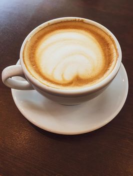 Breakfast, food and drinks and service concept - Cappuccino in a restaurant, at a coffee break