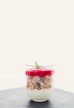 Sweet food, diet nutrition and organic dairy concept - Homemade granola parfait with strawberry jam and mint, yogurt and muesli for healthy breakfast in the morning