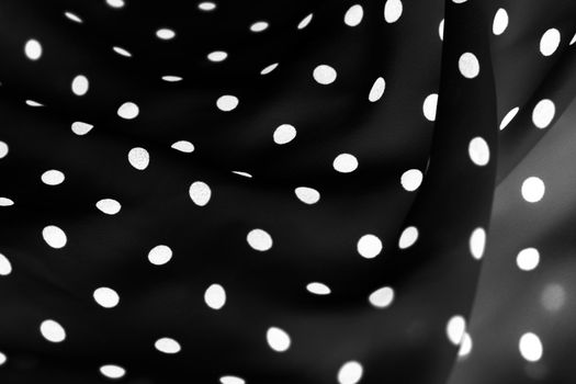 Fashion design, interior decor and classic material concept - Vintage polka dot textile background texture, white dots on black luxury fabric design pattern