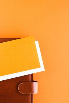 Modern workspace, productivity and corporate lifestyle concept - Luxury business brown brief-case on the office table desk, flatlay