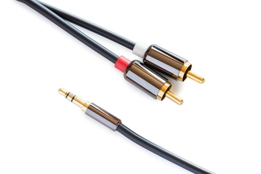 Gold-plated audio cable RCA to Jack 3.5 mm, isolated on white background