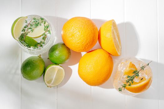 Healthy summer cocktails, mocktails. Set of different citrus lemonades mojitos, with lime, orange, diet detox drinks.