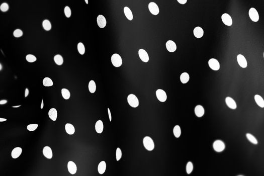 Fashion design, interior decor and classic material concept - Vintage polka dot textile background texture, white dots on black luxury fabric design pattern