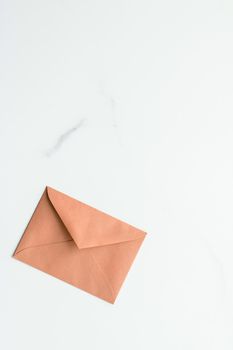 Postal service, newsletter and greeting card concept - Blank paper envelopes on marble flatlay background, holiday mail letter or post card message design