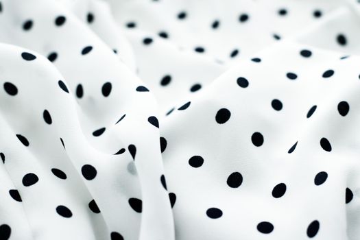 Fashion design, interior decor and vintage material concept - Classic polka dot textile background texture, black dots on white luxury fabric design pattern