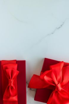 Romantic celebration, lifestyle and birthday present concept - Luxury red holiday gifts on marble