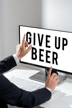 Text showing inspiration Give Up Beer, Business concept Stop drinking alcohol treatment for addiction healthy diet Hand Holding Panel Board Displaying Latest Financial Growth Strategies.
