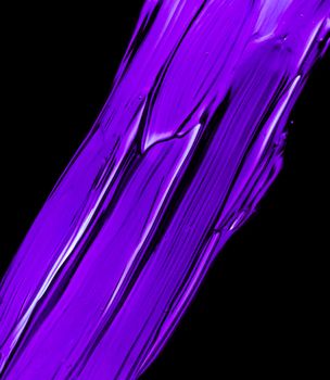 Art abstract, cosmetic product and hand painted design concept - Purple neon paint brush stroke texture isolated on black background