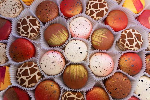 delicious cakes macaroni cookies. Multi-colored macaroni biscuits close-up in a box. Box of fresh colorful French macaroon pastry cookies.