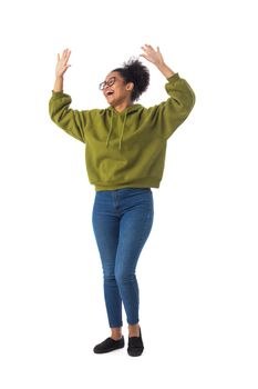 Black woman wearing casual clothes cheering with arms stretched screaming of joy full length portrait isolated over a white background