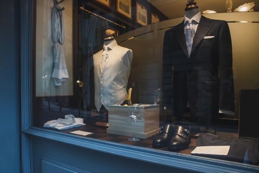 Luxury shop window with Stylish men's suits in Italy