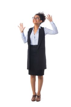 Full length portrait of African American black mixed race attractive young businesswoman student cheering with her arms raised isolated on white background