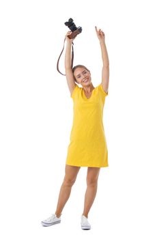 Woman photographer with arms raised, isolated on white background