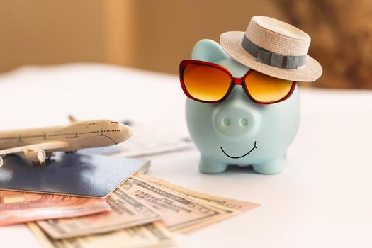Piggy bank summer vacation, travel, retirement saving concept.