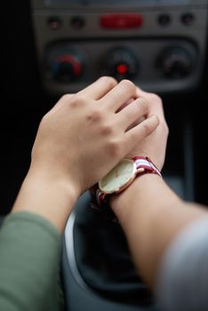 Life is a journey. Closeup shot of a couple holding hands while driving in a car