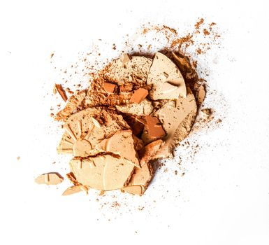 Beauty texture, cosmetic product and art of make-up concept - Crushed eyeshadows and powder isolated on white background