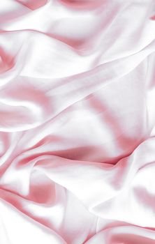 Elegant fabric texture, abstract backdrop and modern pastel colours concept - Pink soft silk waves, flatlay background