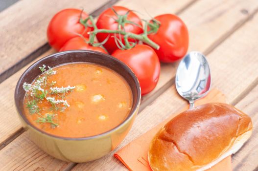 tomato soup with meat balls, a traditional Belgian dish, served with a bun, exotic food. High quality photo