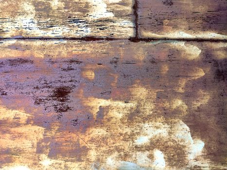 Corroded metal background. Rusted white painted metal wall. Rusty metal background with streaks of rust. Rust stains. The metal surface rusted spots. Rystycorrosion.