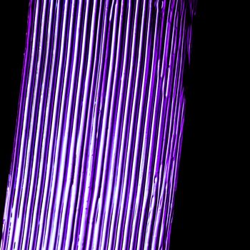 Art abstract, cosmetic product and hand painted design concept - Purple neon paint brush stroke texture isolated on black background