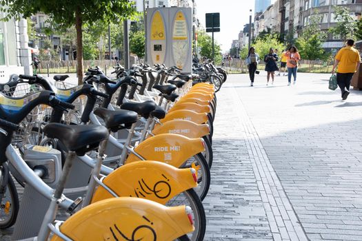 BRUSSELS,BELGIUM - June 02, 2022: public Villo bicycles parked in the sharing, High quality photo