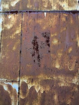 Rusty corrosion and oxidized background. Grunge rusted metal texture background. High resolution image of oxidized iron steel sheet wall.