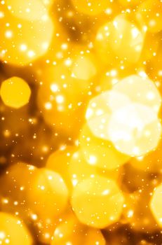 Golden Christmas lights, New Years Eve fireworks and abstract texture concept - Glamorous gold shiny glow and glitter, luxury holiday background