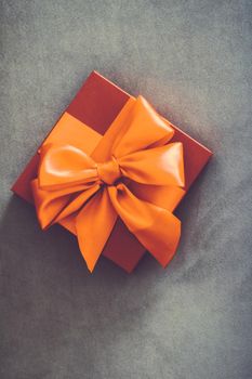 Birthday present, shop sale promotion and autumn decoration concept - Vintage luxury holiday orange gift box with silk ribbon and bow, christmas or valentines day decor