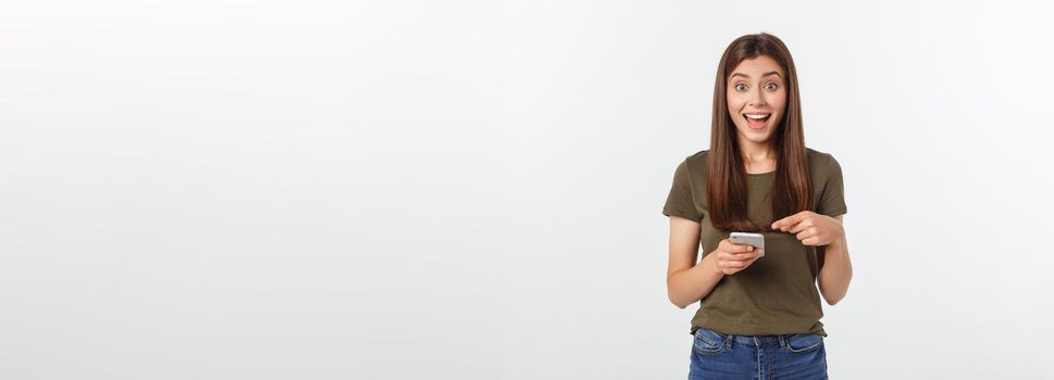 Laughing woman talking and texting on the phone isolated on a white background