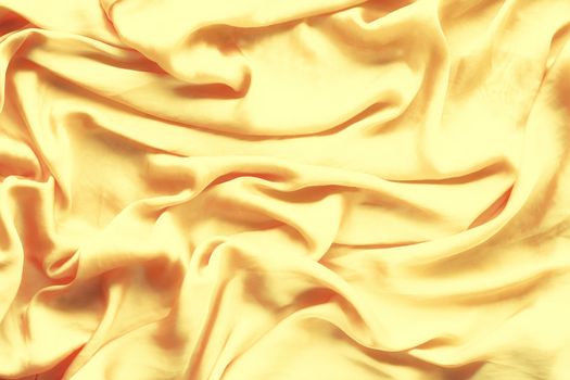 Luxury golden silk background texture - elegant fabric textures, abstract backgrounds and modern pastel colours concept