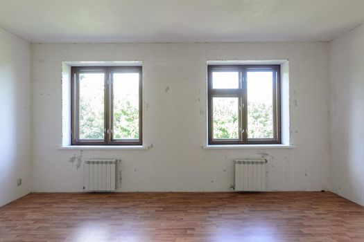 View of two windows in a room with a fine finish a