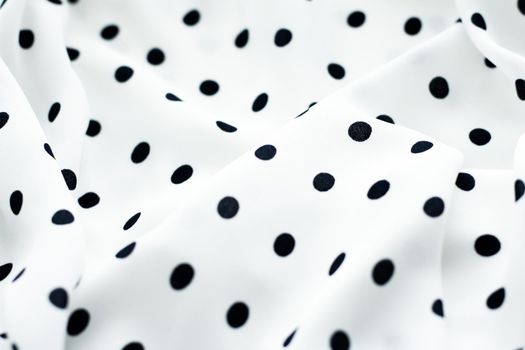 Fashion design, interior decor and vintage material concept - Classic polka dot textile background texture, black dots on white luxury fabric design pattern