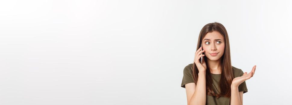 Worried young woman looks nervously, Female is nervous while talking on the phone, feels frustrated and worrying phone talk concept.