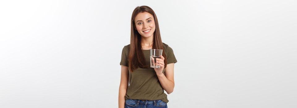 portrait of attractive caucasian smiling woman isolated on white studio shot drinking water